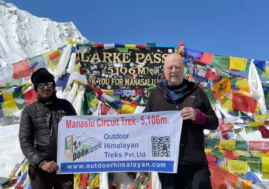 How much does trekking cost in nepal? (a realistic 2026 budget). 4 78-years old Hiker at Larke Pass 5106m on the Manaslu Circuit,